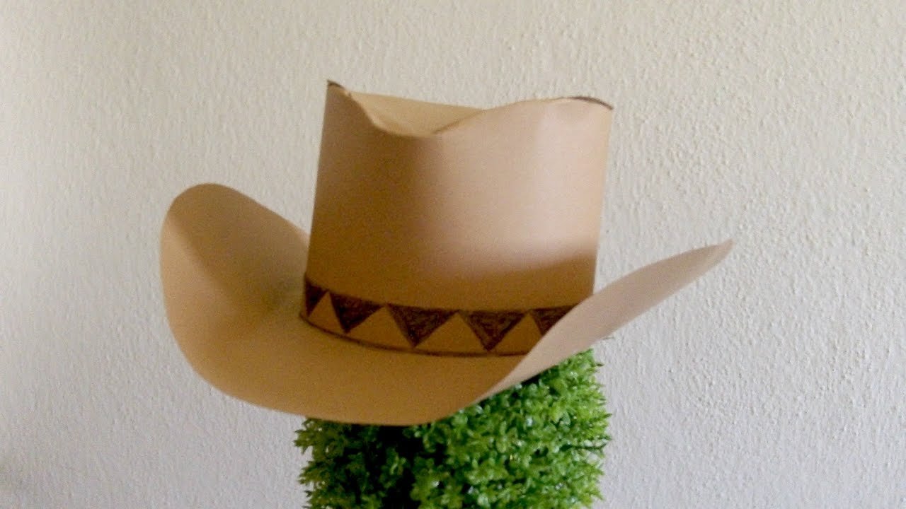Как сделать ковбоя из бумаги. Шляпка из бумажного стаканчика. Оригами ковбойская шляпа. Ковбойская шляпа в руках. Ковбойская шляпа своими руками из бумаги.