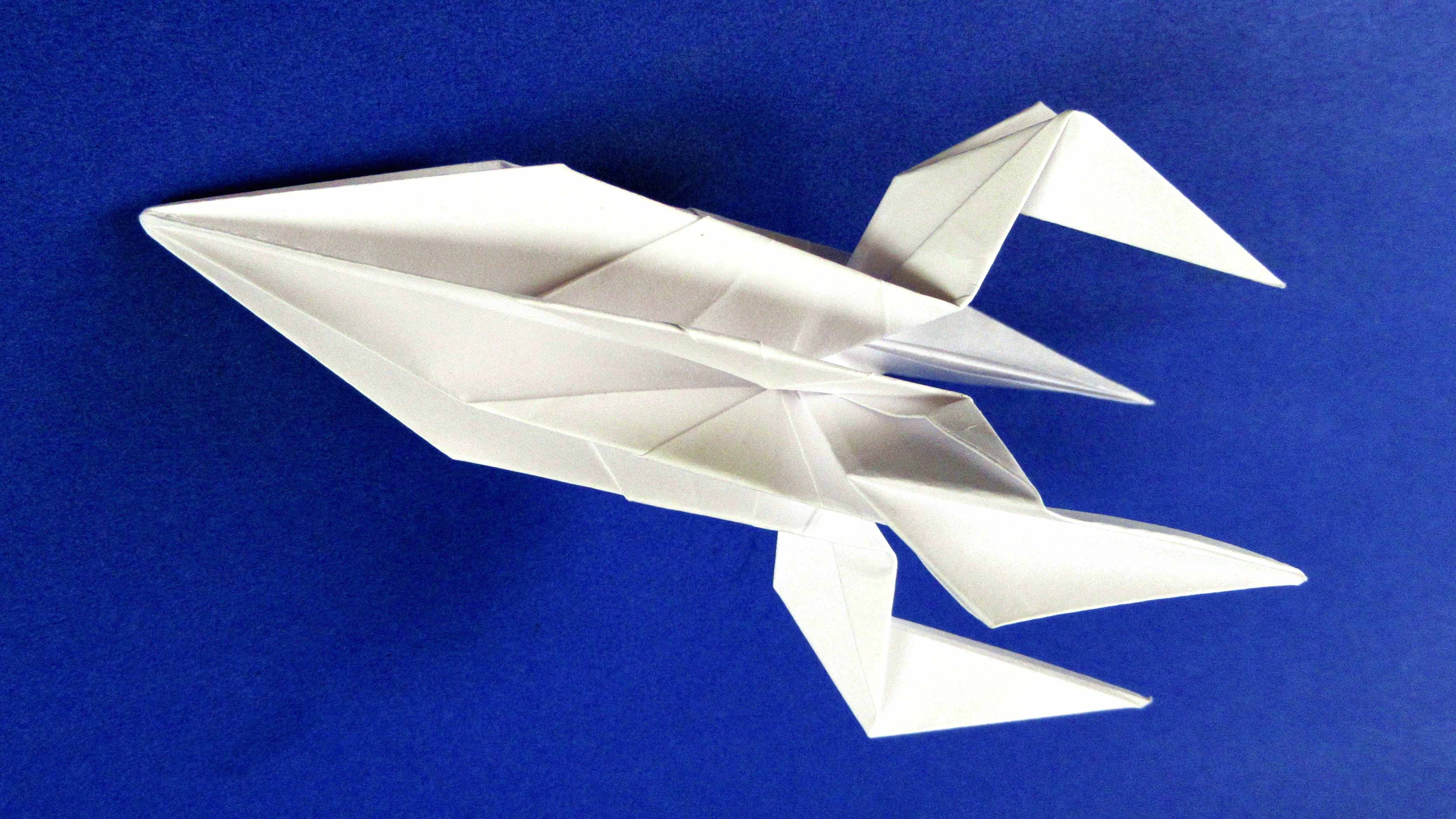 Оригами ко дню космонавтики в детском саду. Оригами ракета. Оригами ко Дню космонавтики. Поделка ко Дню космонавтики оригами. Поделка ракета из бумаги оригами.