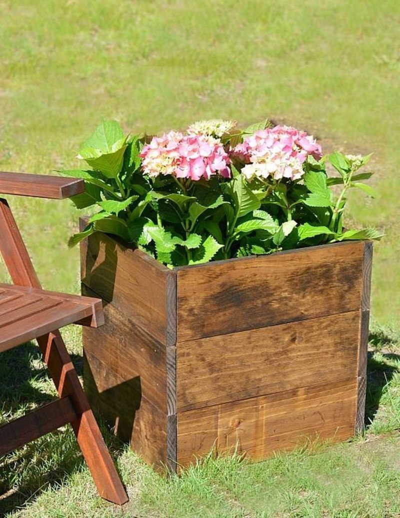 Wooden pots for flowers street