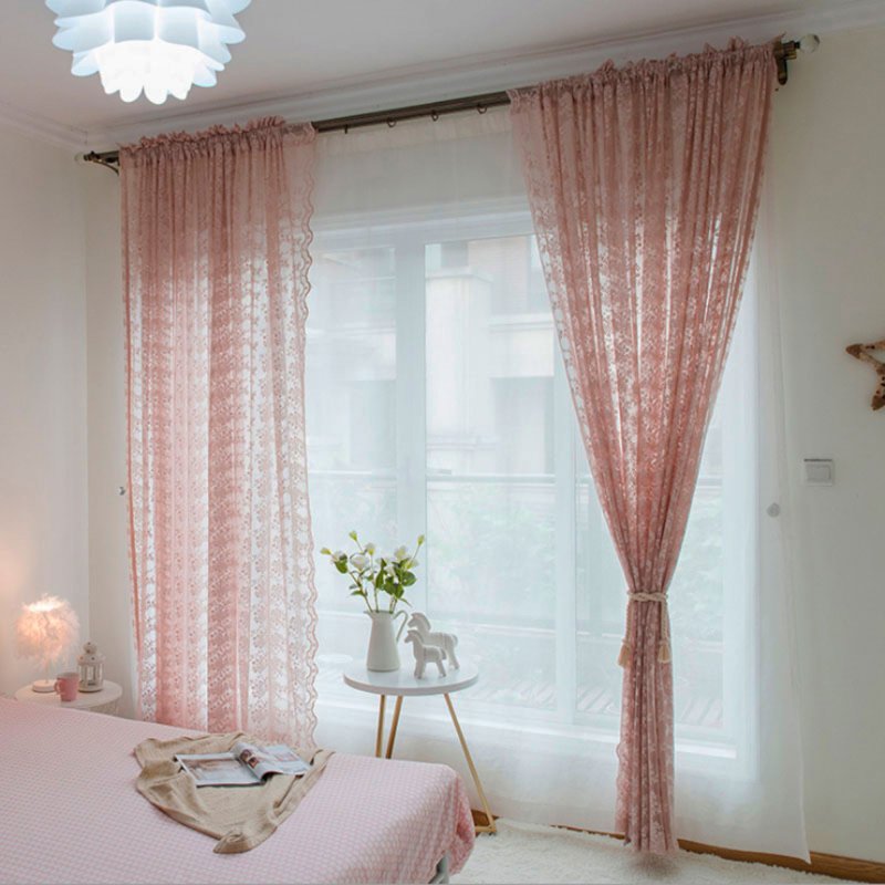 Tulle in a bedroom without curtains