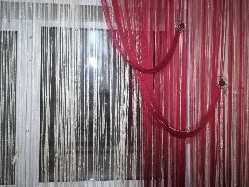 Curtains of thread in the interior