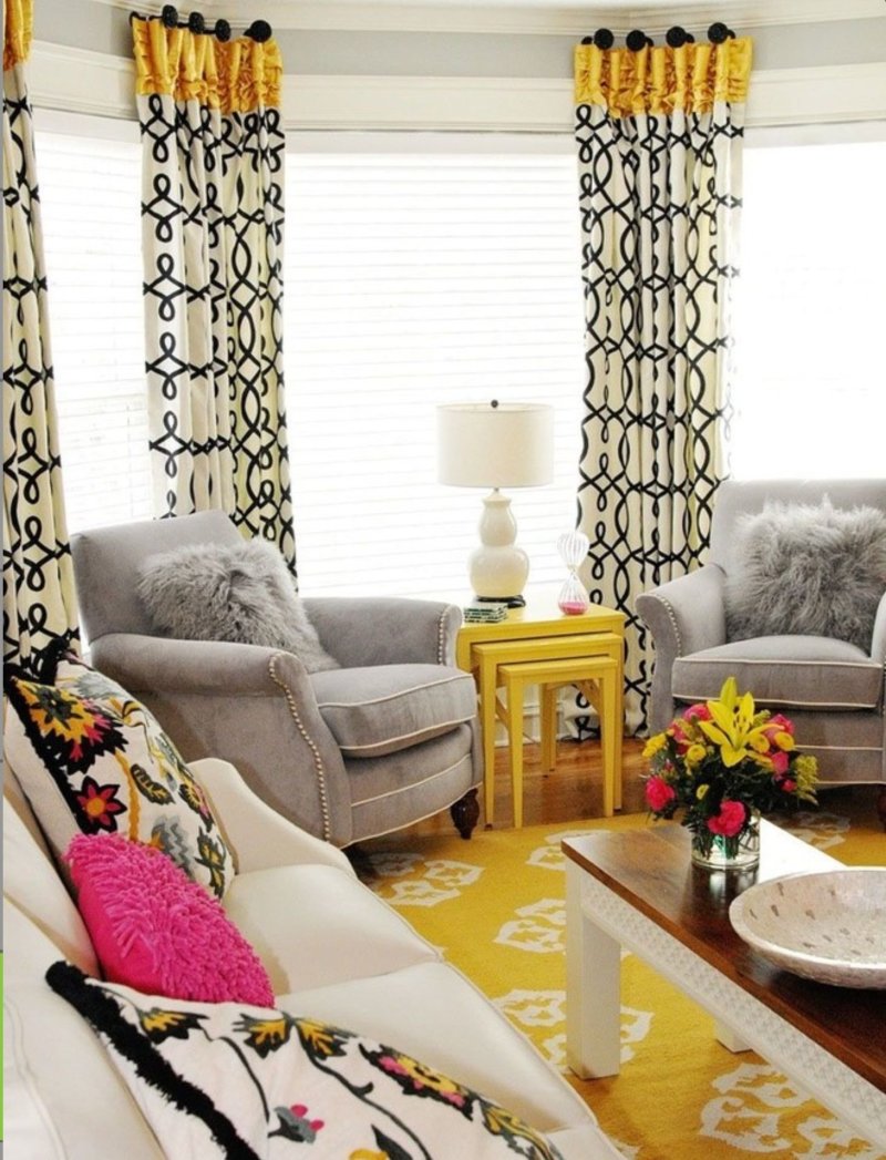 Yellow curtains in the interior of the living room