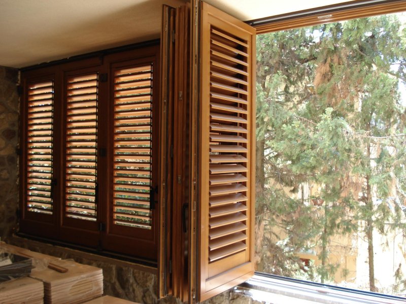 The shutters are wooden