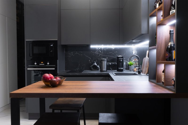 Black kitchen in the interior