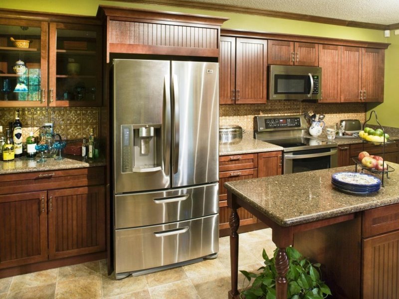 Kitchen with a large refrigerator