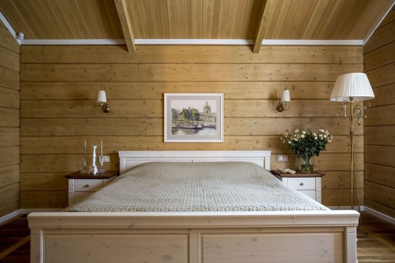 Bedroom interior in a wooden house