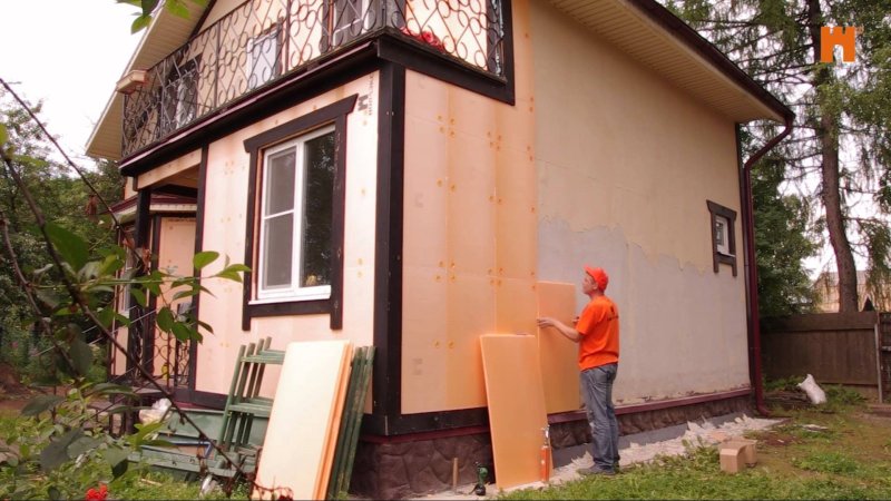 The insulation of the facade with a foam