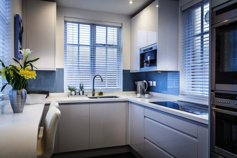 Kitchens with a window in a modern style