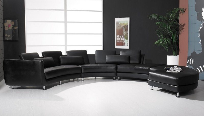 The leather sofa is semicircular