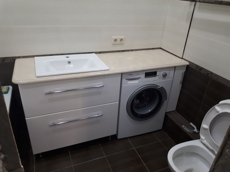 Sink with a countertop under the washing machine