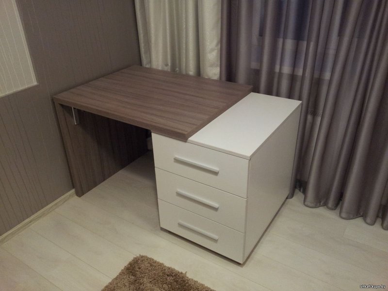 Written table with a cabinet