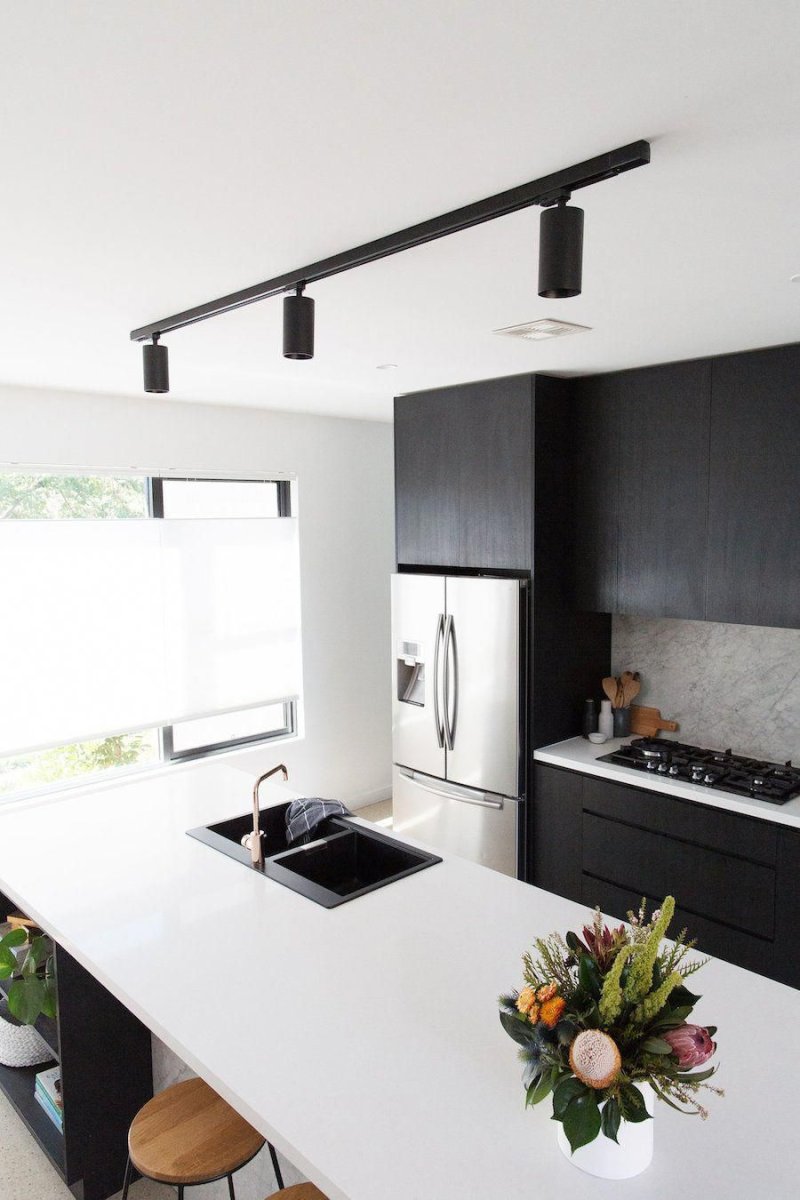 Track lamps in the interior of the kitchen