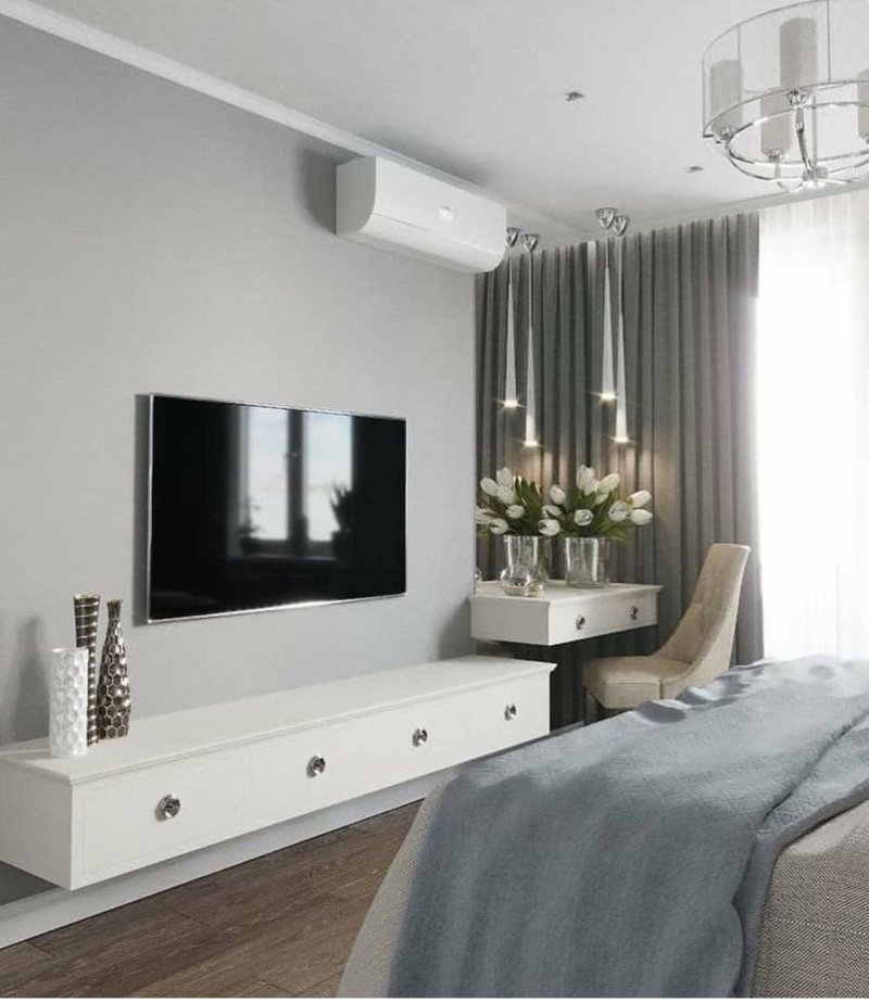 TV zone in a bedroom in a modern style