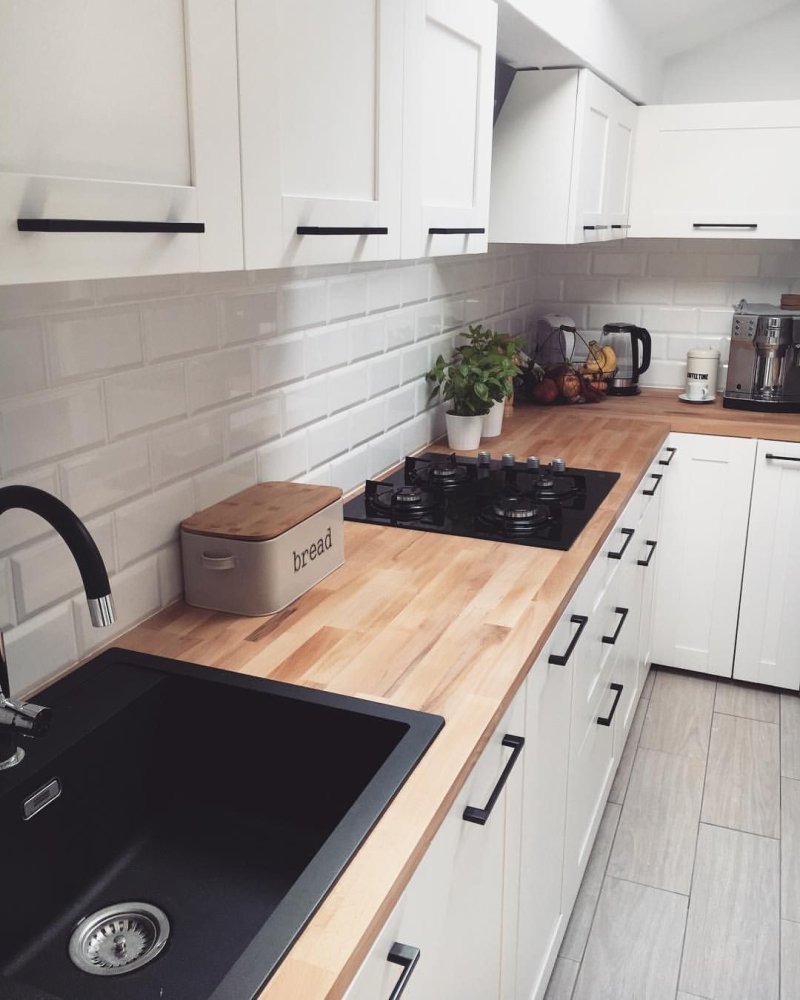 Ikea kitchen white with a wooden countertop