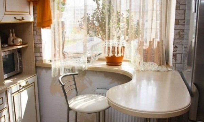 Kitchen with a windowsill of a countertop