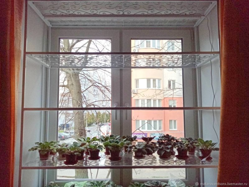 Shelf for flowers on the windowsill