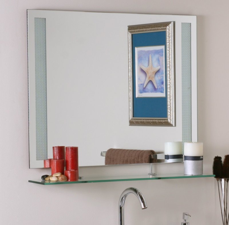 Mirror in the bathroom with a shelf