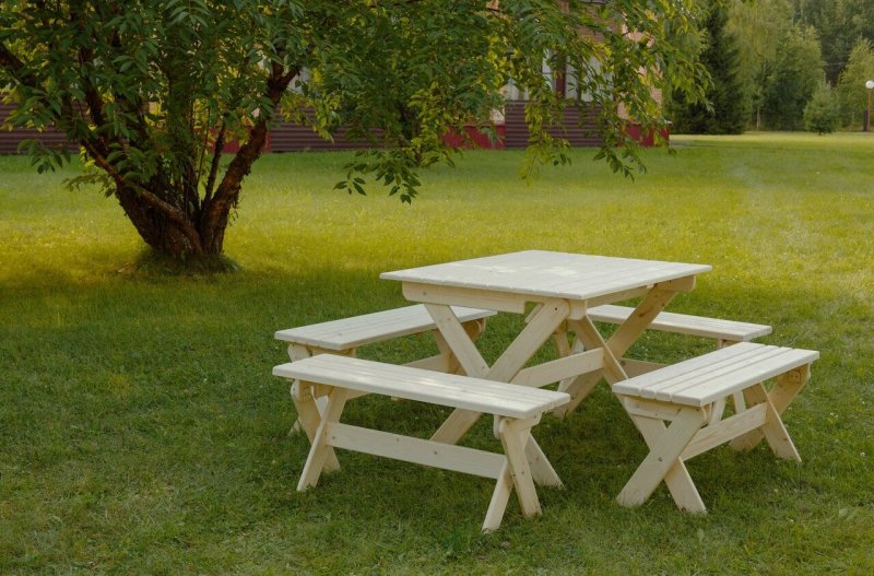 Table with benches for a summer residence