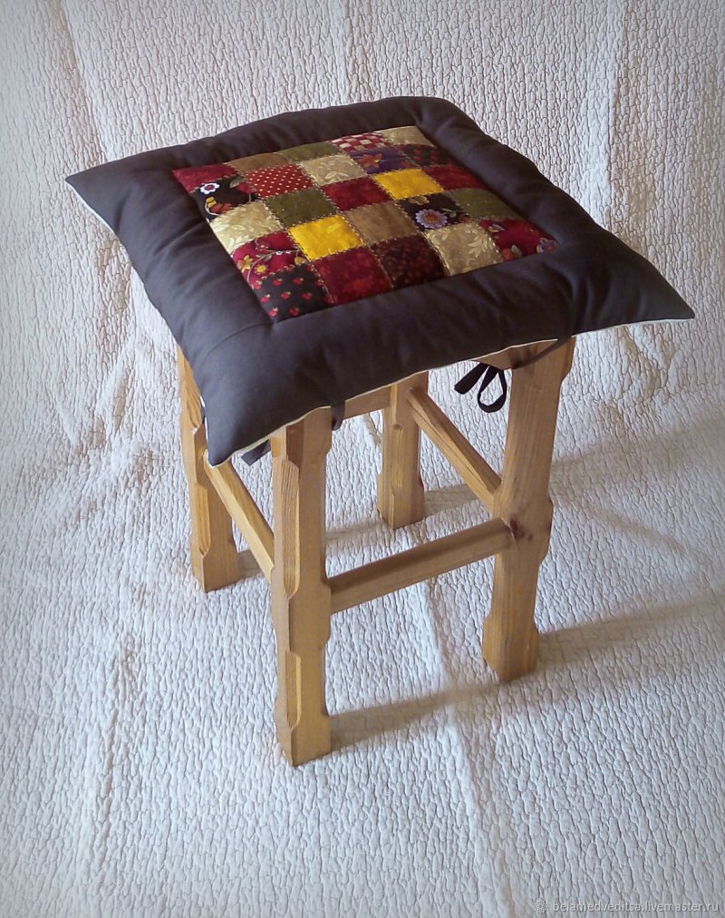 A pillow on a stool