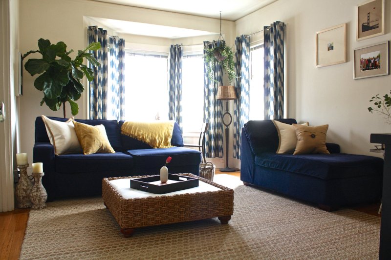 Blue sofa in the interior of the living room