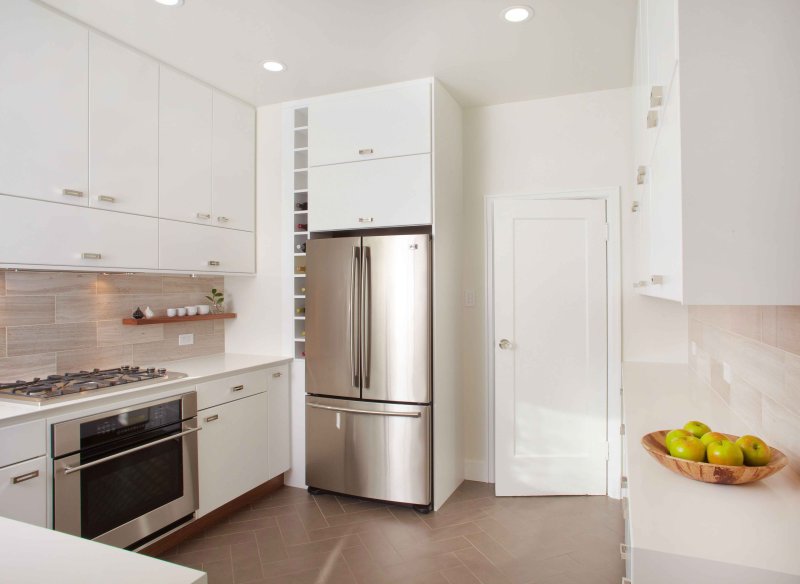 Kitchen design with a refrigerator