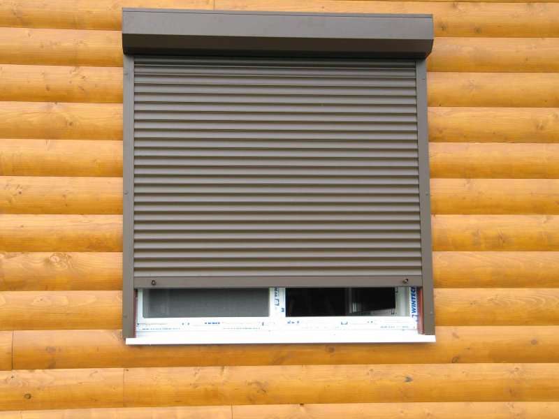 Roller shutters on the windows for giving