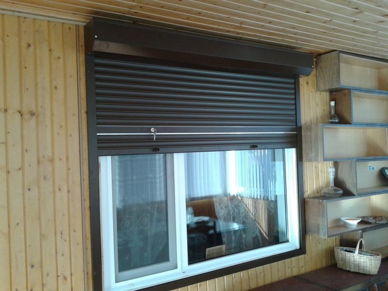 Roller shutters on the windows for giving