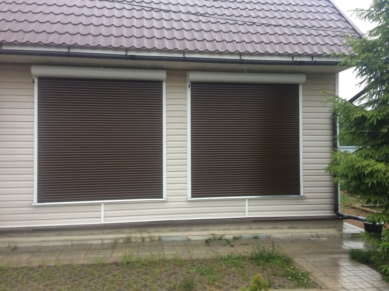 Roller shutters on the windows for giving