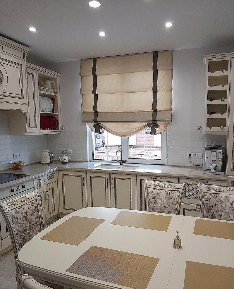 Roman curtains in the interior of the kitchen