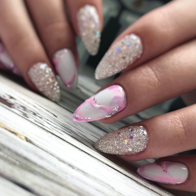 Manicure design delicate almonds with sparkles