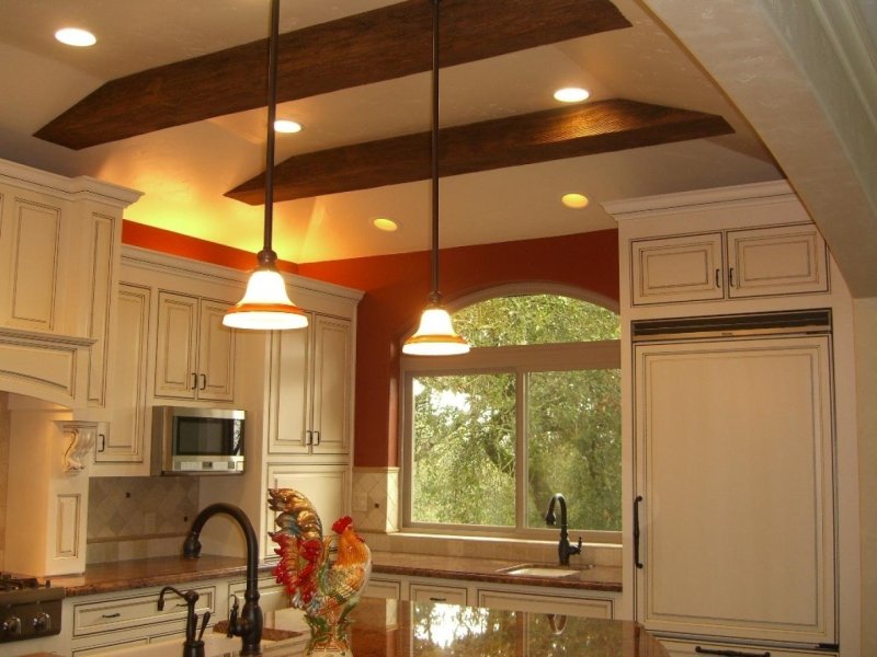 Kitchen with beams on the ceiling