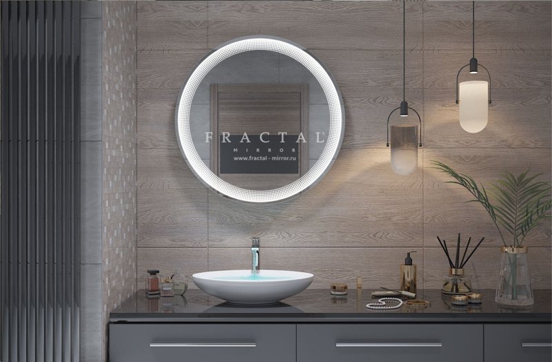 Round mirror in the interior of the bathroom