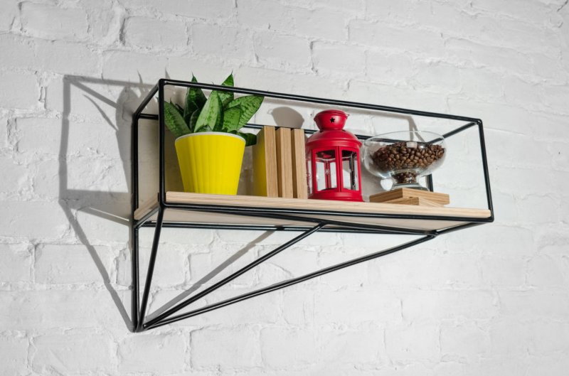 Hinged shelf in the style of loft