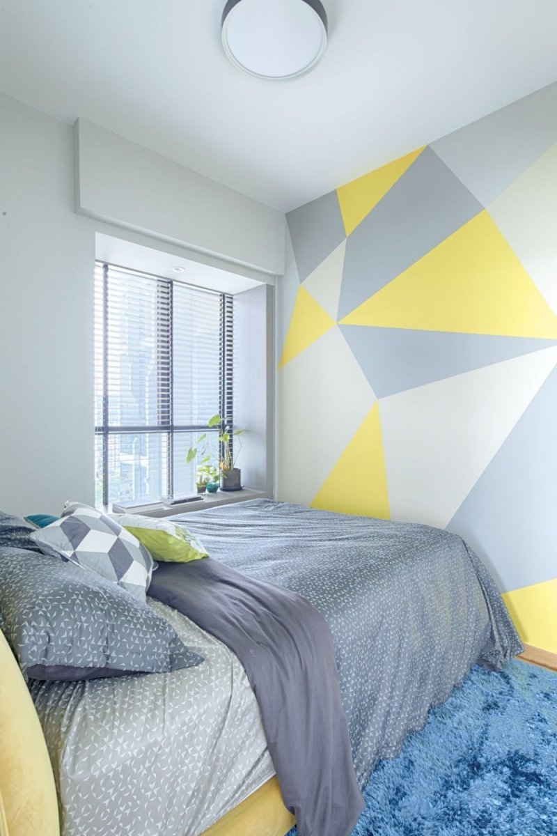 Teenage room in gray yellow tones