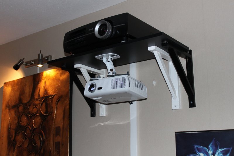 Shelf for the projector on the wall