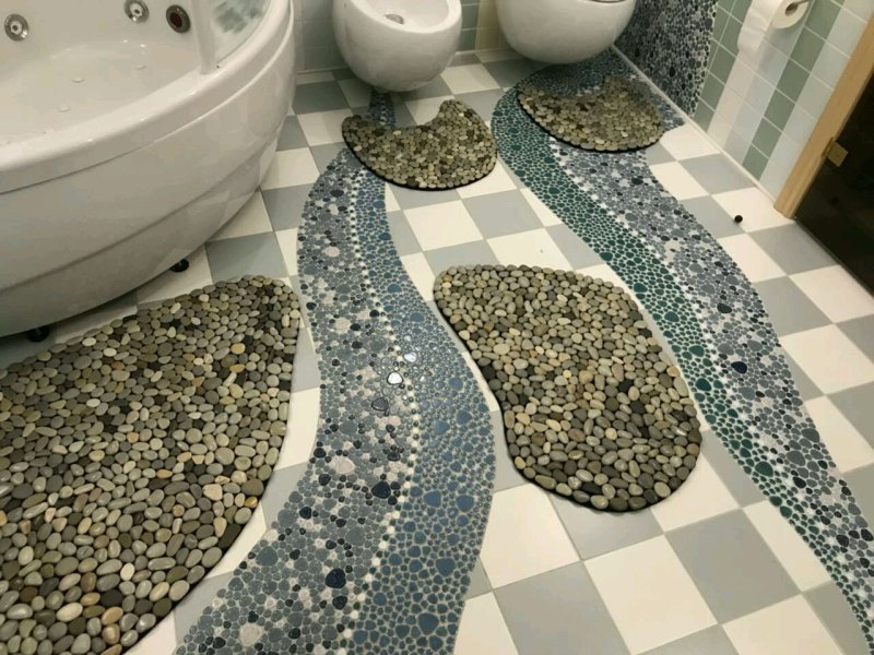 Mosaic on the floor in the bathroom