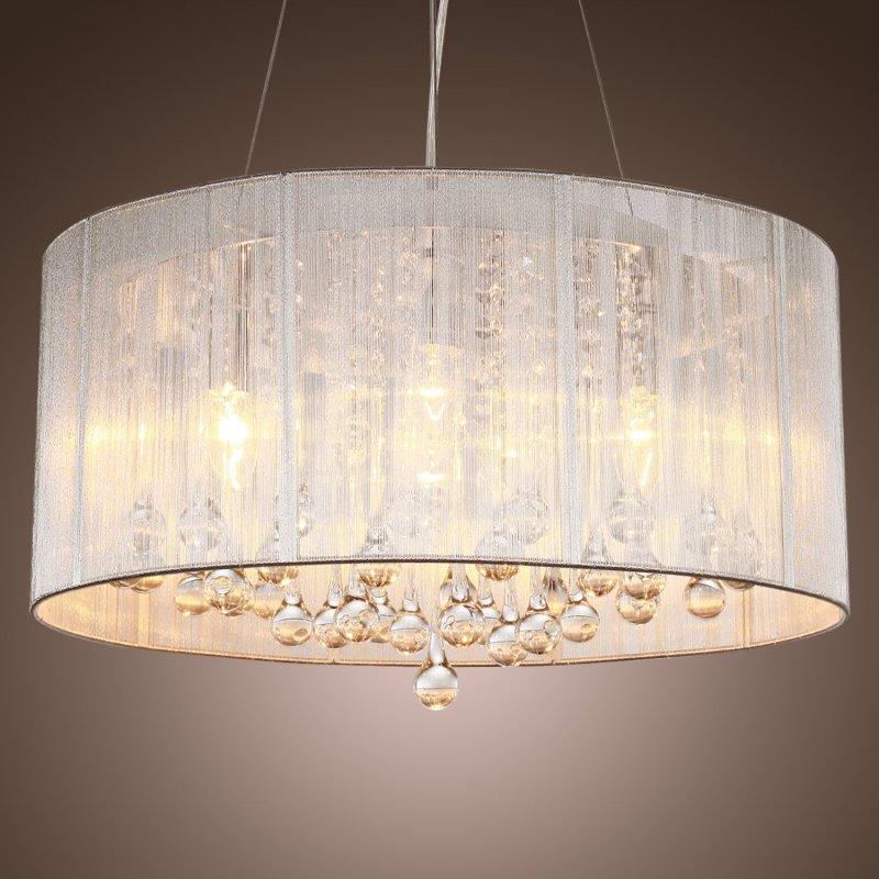 A chandelier with a lampshade