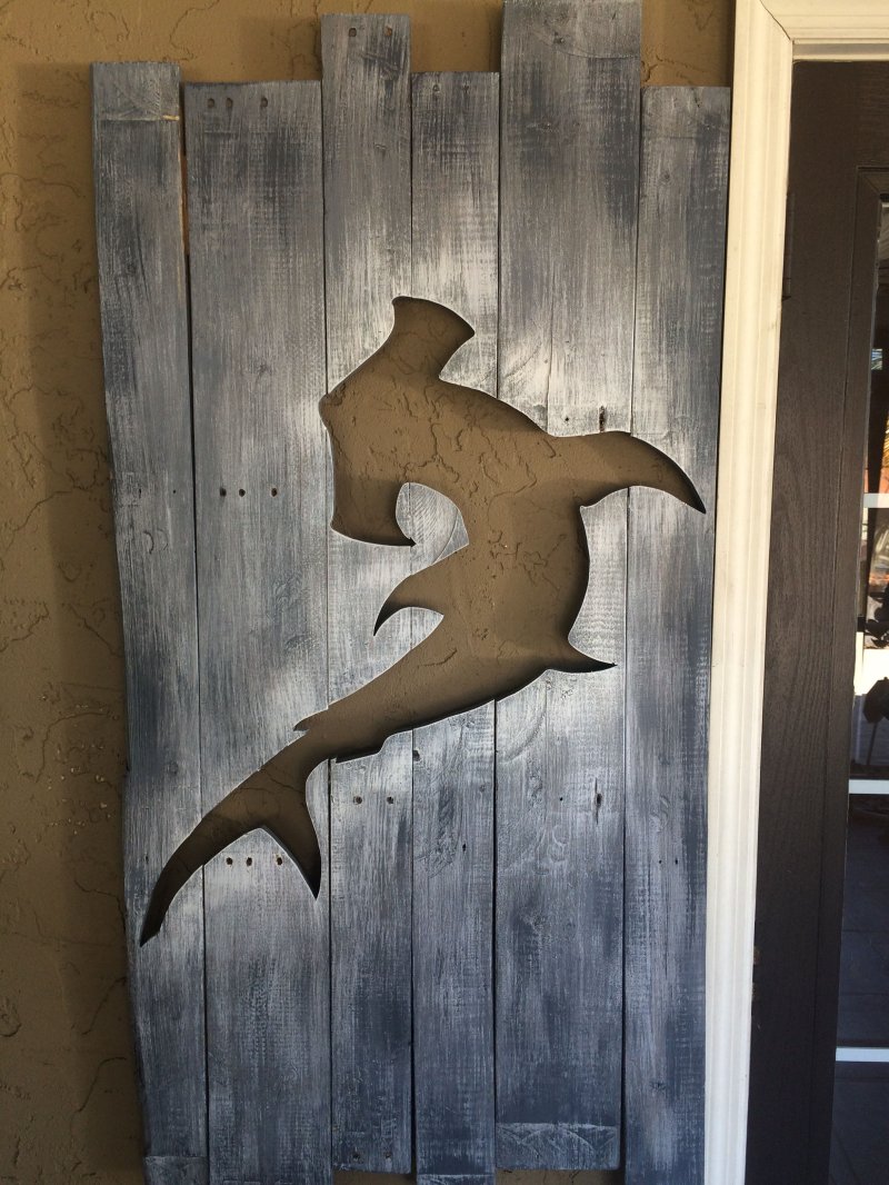 Wooden shark on the wall