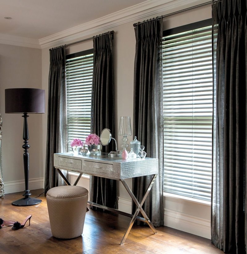 Blinds with curtains in the interior