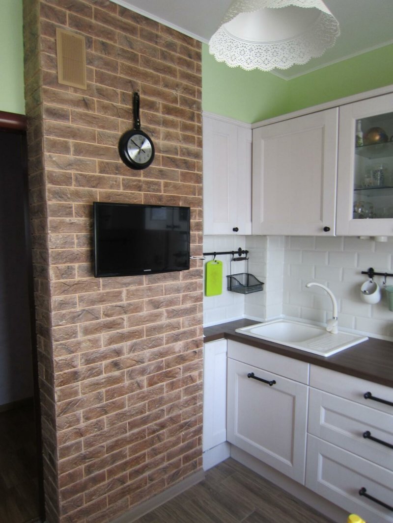 Kitchen with decorative brick