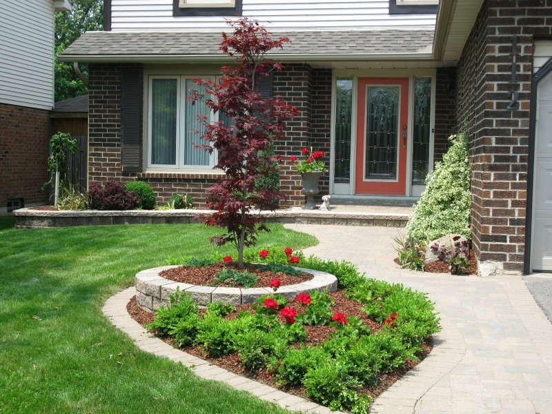 Flower garden design in front of the house