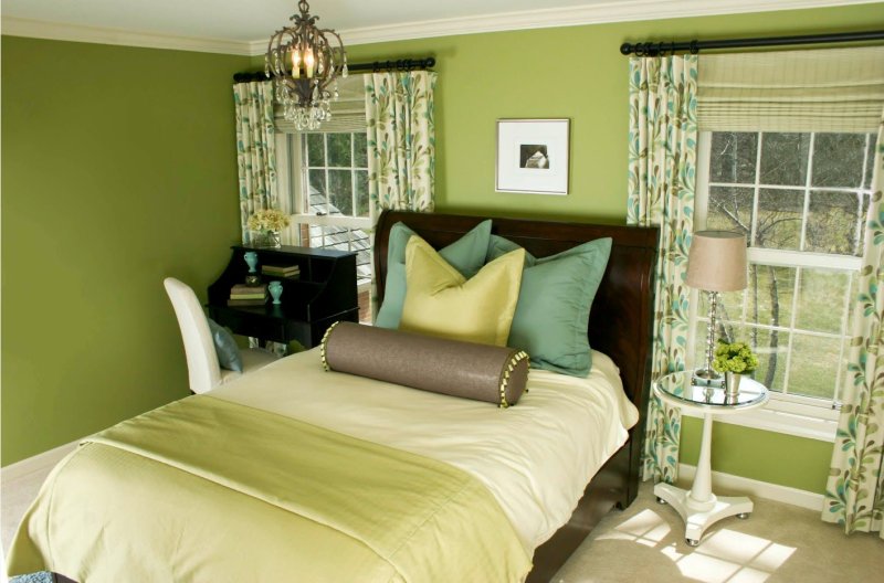 The interior of the bedroom in green colors