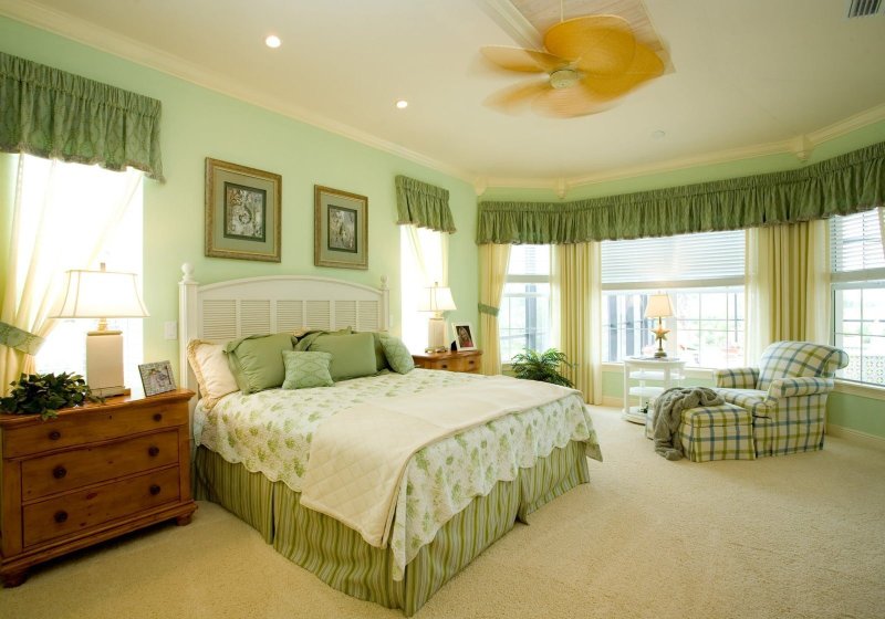 Pistachio color in the interior of the bedroom