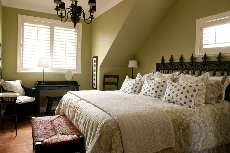 The interior of the bedroom in olive tones