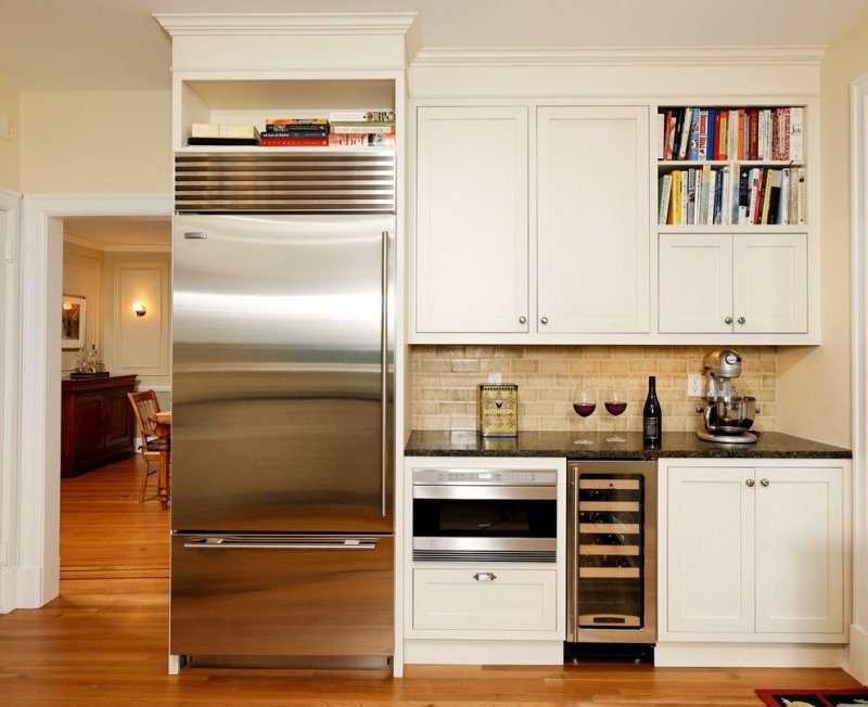 Kitchen with a large refrigerator