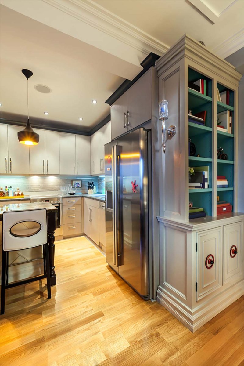 Kitchen with a large refrigerator