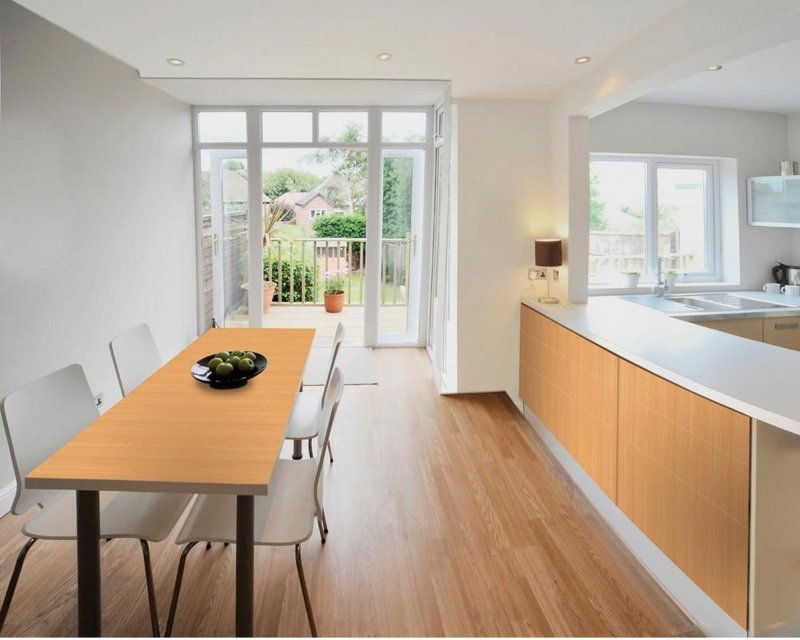 Window to the floor in the kitchen in the apartment