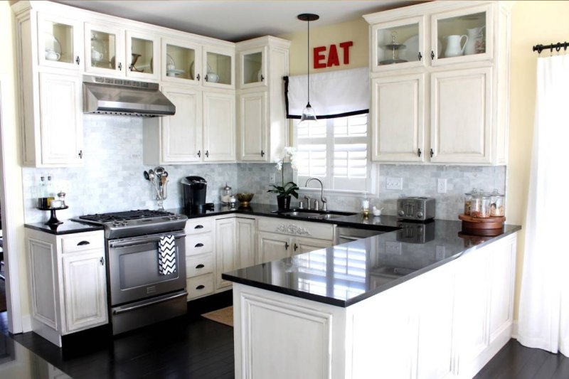 White kitchen with a black countertop