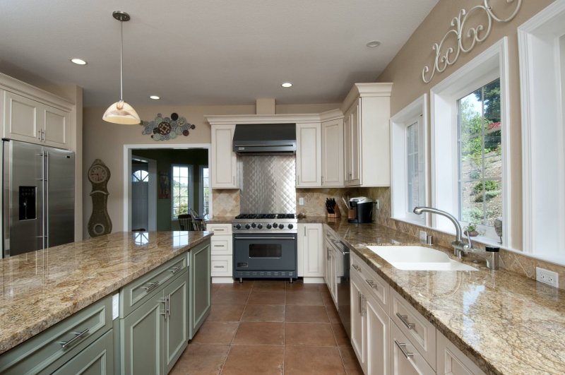 Beige kitchen with marble tabletop