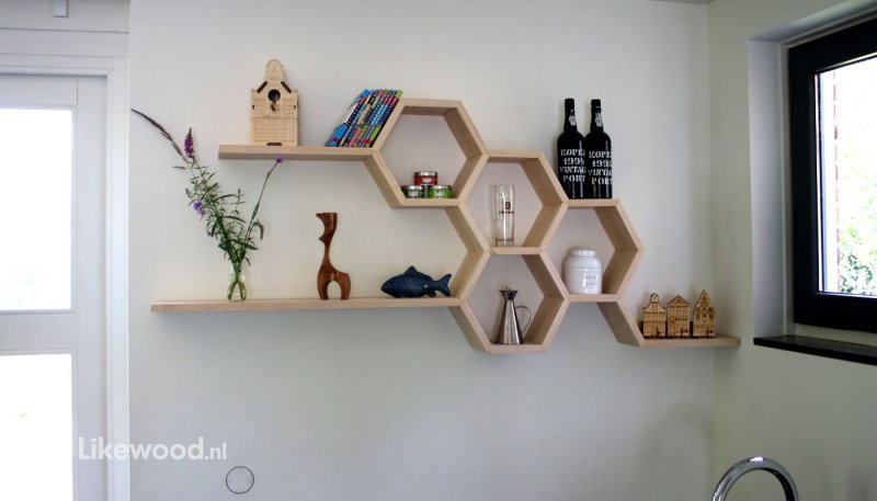 Shelves in the form of honeycombs on the wall